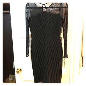 Chic form-fitting black Calvin Klein dress
